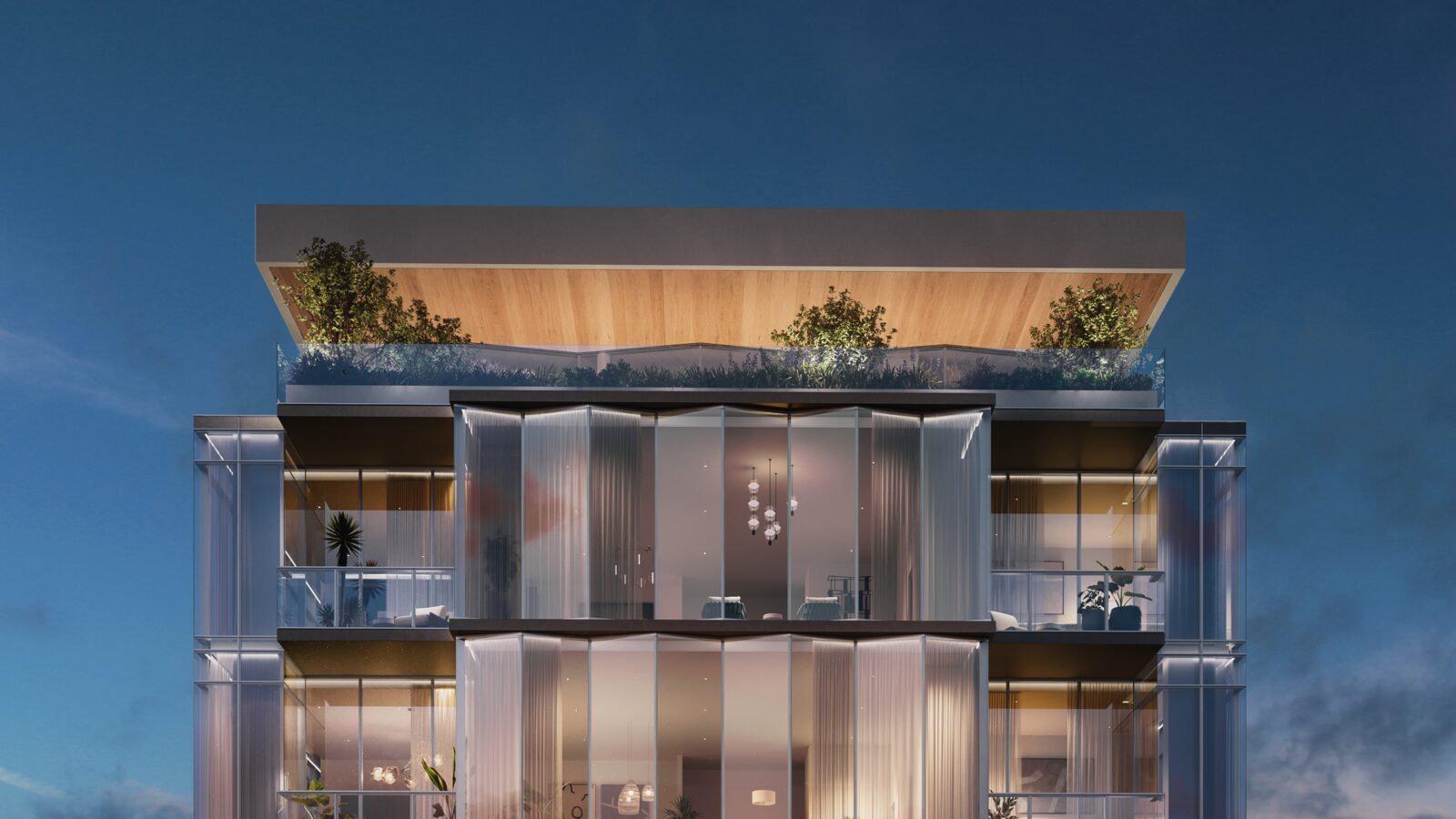 Illuminated crown of The Residences at The Dallas EDITION at dusk