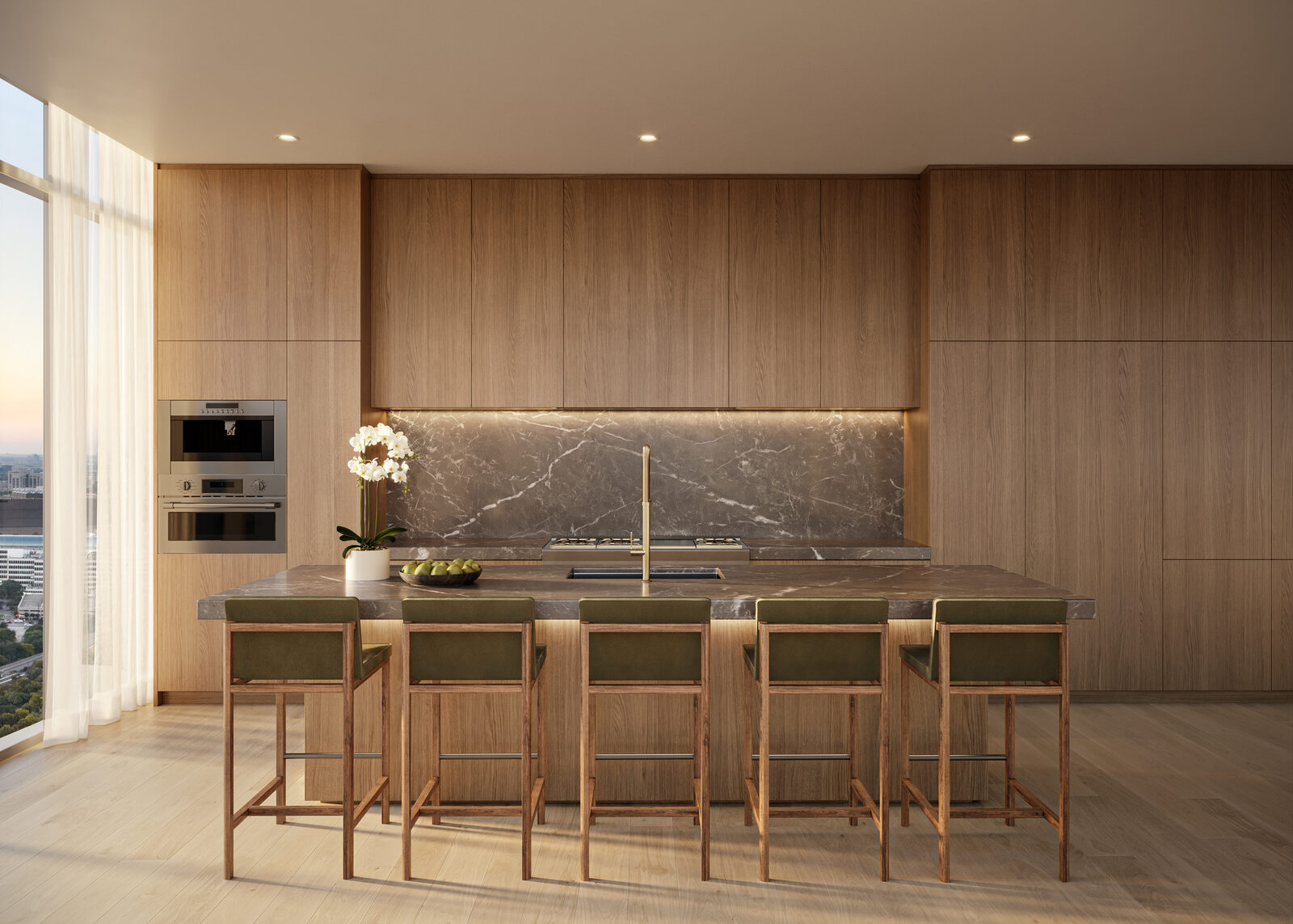 Dark-finish residence kitchen with natural stone surfaces
