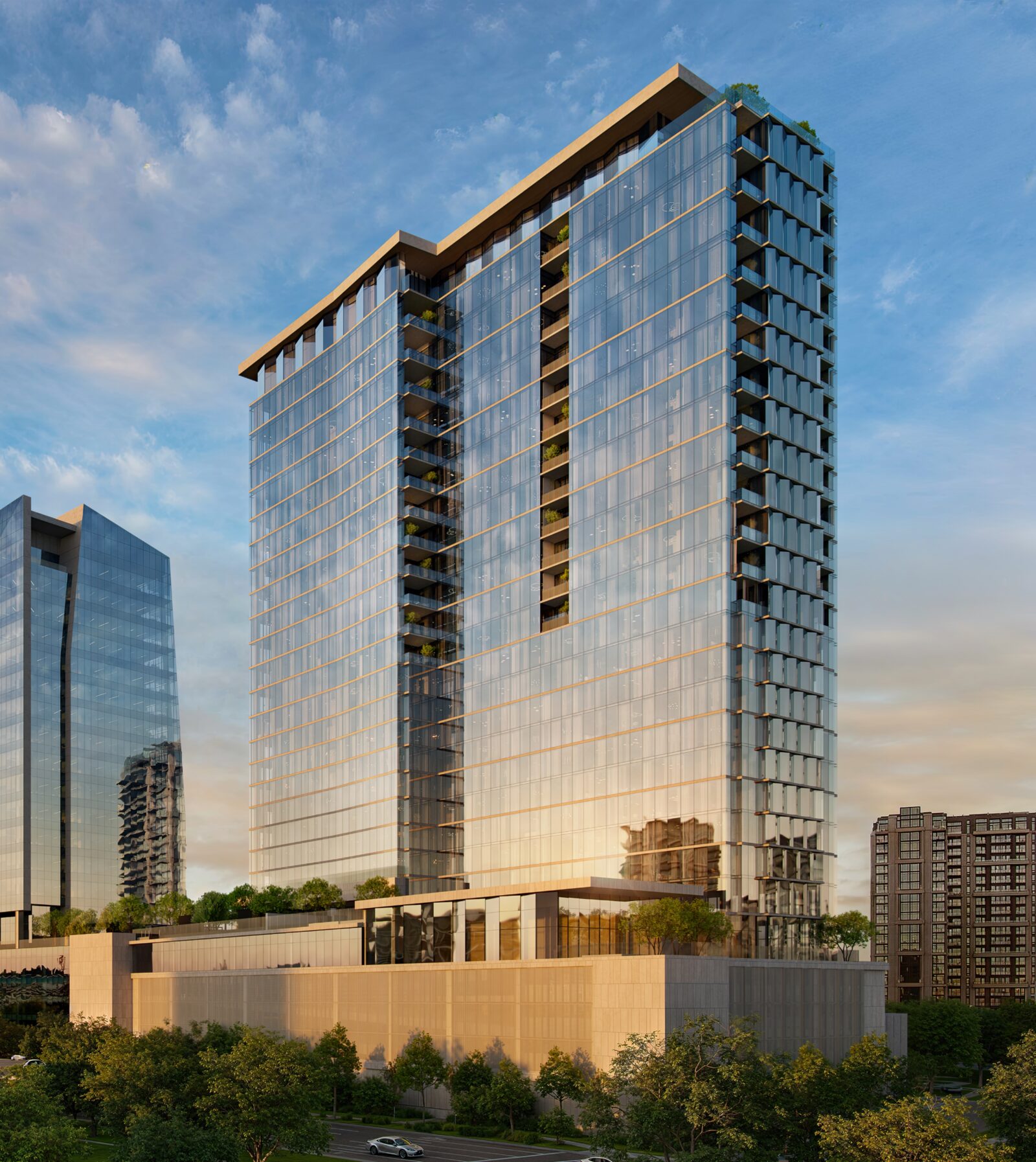The Dallas EDITION tower rising above its landscaped setting