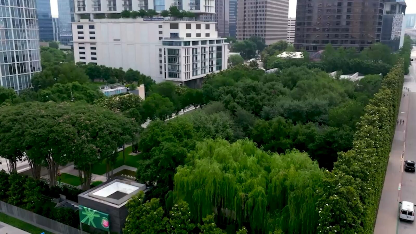Aerial view of the parks and tree canopy surrounding Uptown Dallas