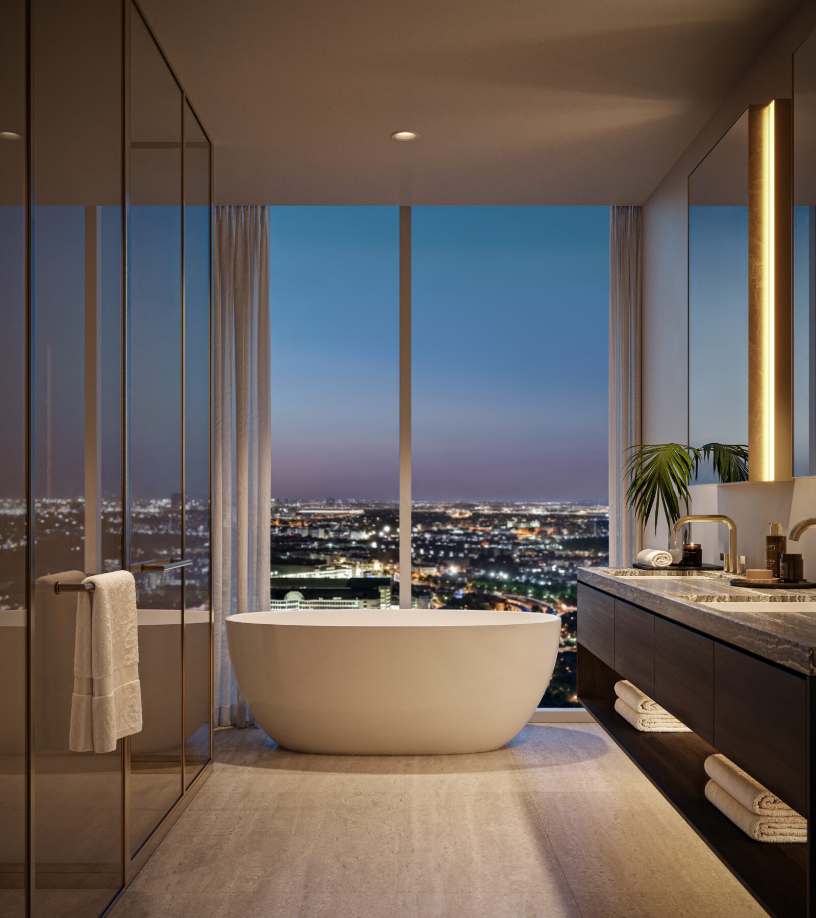 Freestanding bathtub overlooking Dallas at dusk